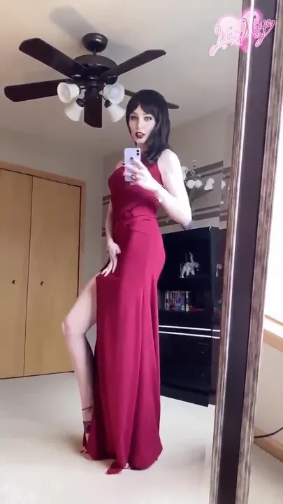 Lucia Maya in red dress