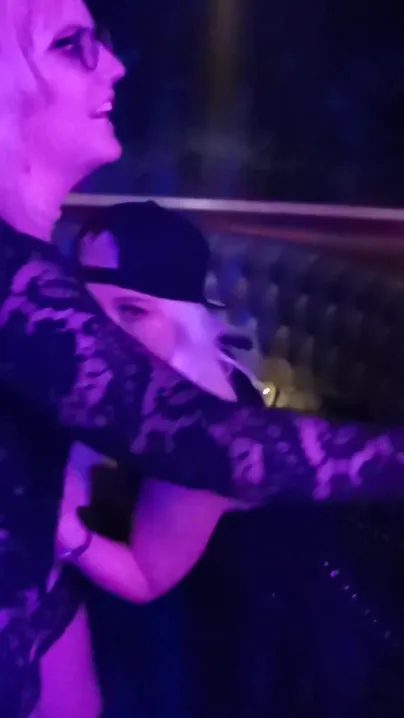 Drunk slut wants a tit to suck on in nightclub