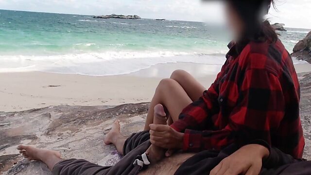 Brazilian couple perform handjob routine by the sea - risky public sex