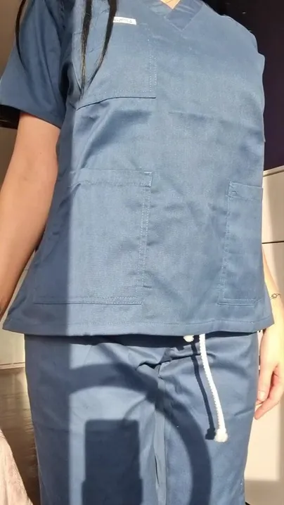 These scrubs are XS but they still don't do my boobs justice
