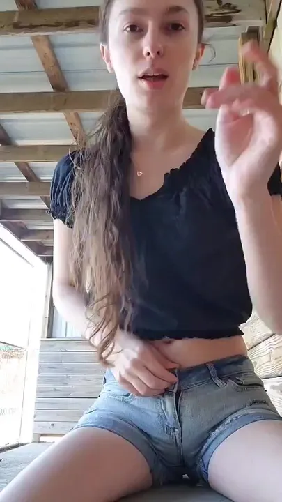 Kitty Lynn Stripping Out of Her Jean Shorts