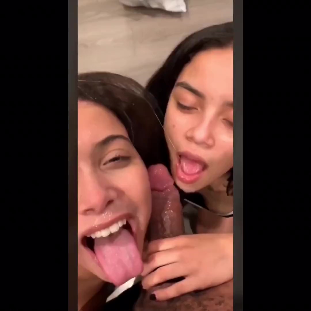 Two girls sucking big dick photo