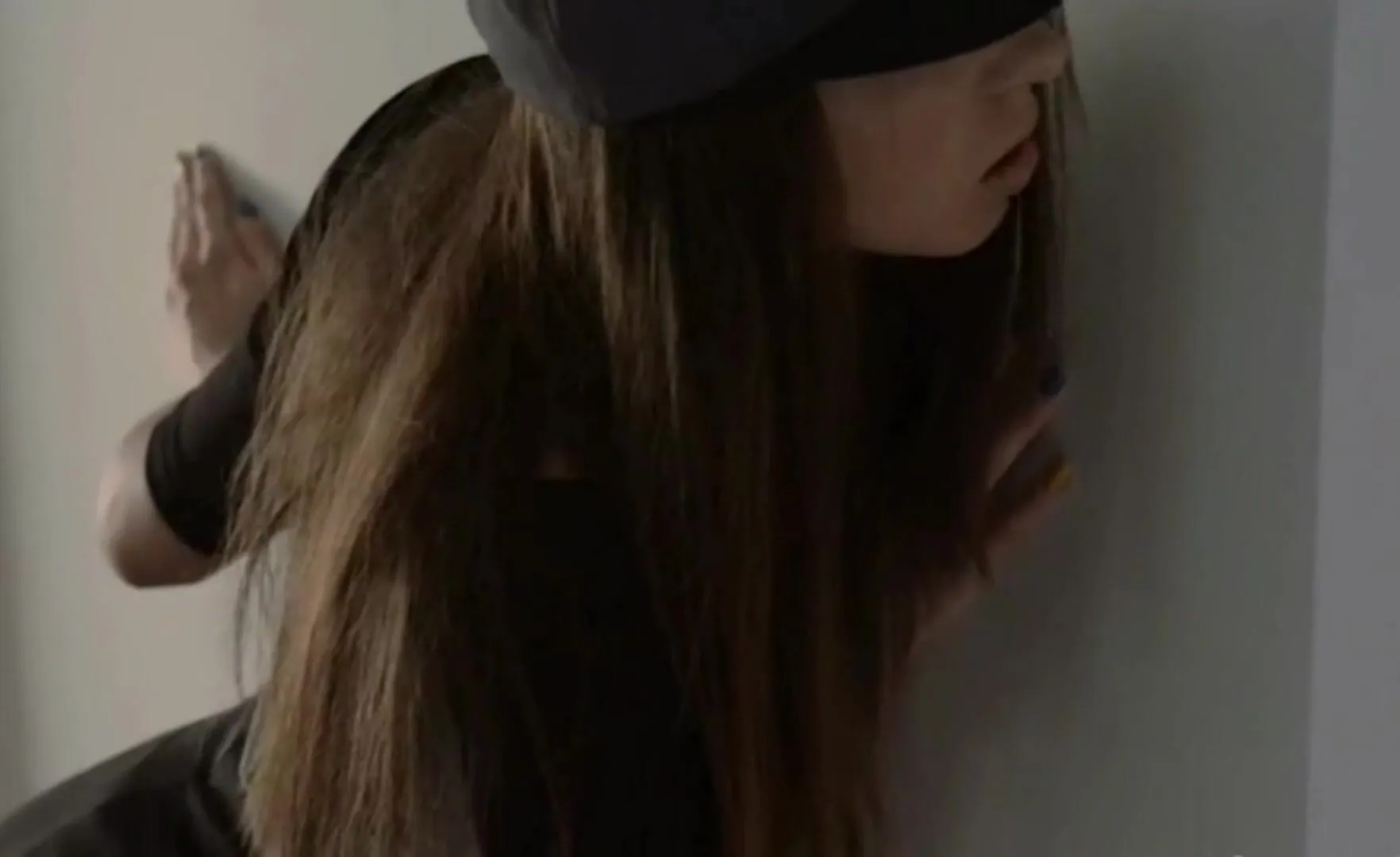 secretly watching her roommates