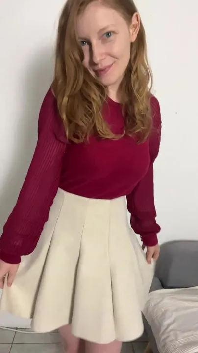 A slightly dorky reveal from a busty redhead!