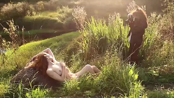 Behind the scenes of naked models having a photoshoot in the woods