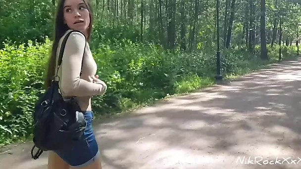 Skinny teen fucks in the woods in a public place and stretches her asshole on his cock.
