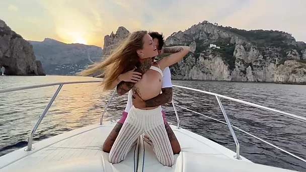 Rich teen beauty makes love with boat captain in the sea