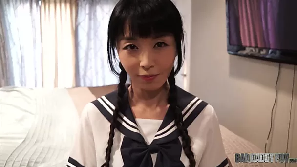 Petite Japanese In a School Uniform Tames a Dick With Her Hairy Pussy
