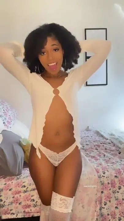 ebony angel in white stripping down for you