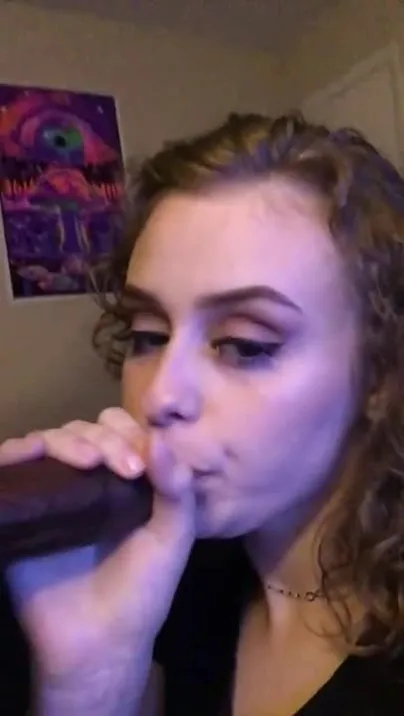 White girl sucks her man's black cock