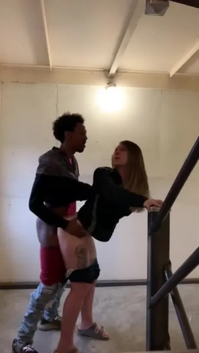 White gf takes black cock on the stairway