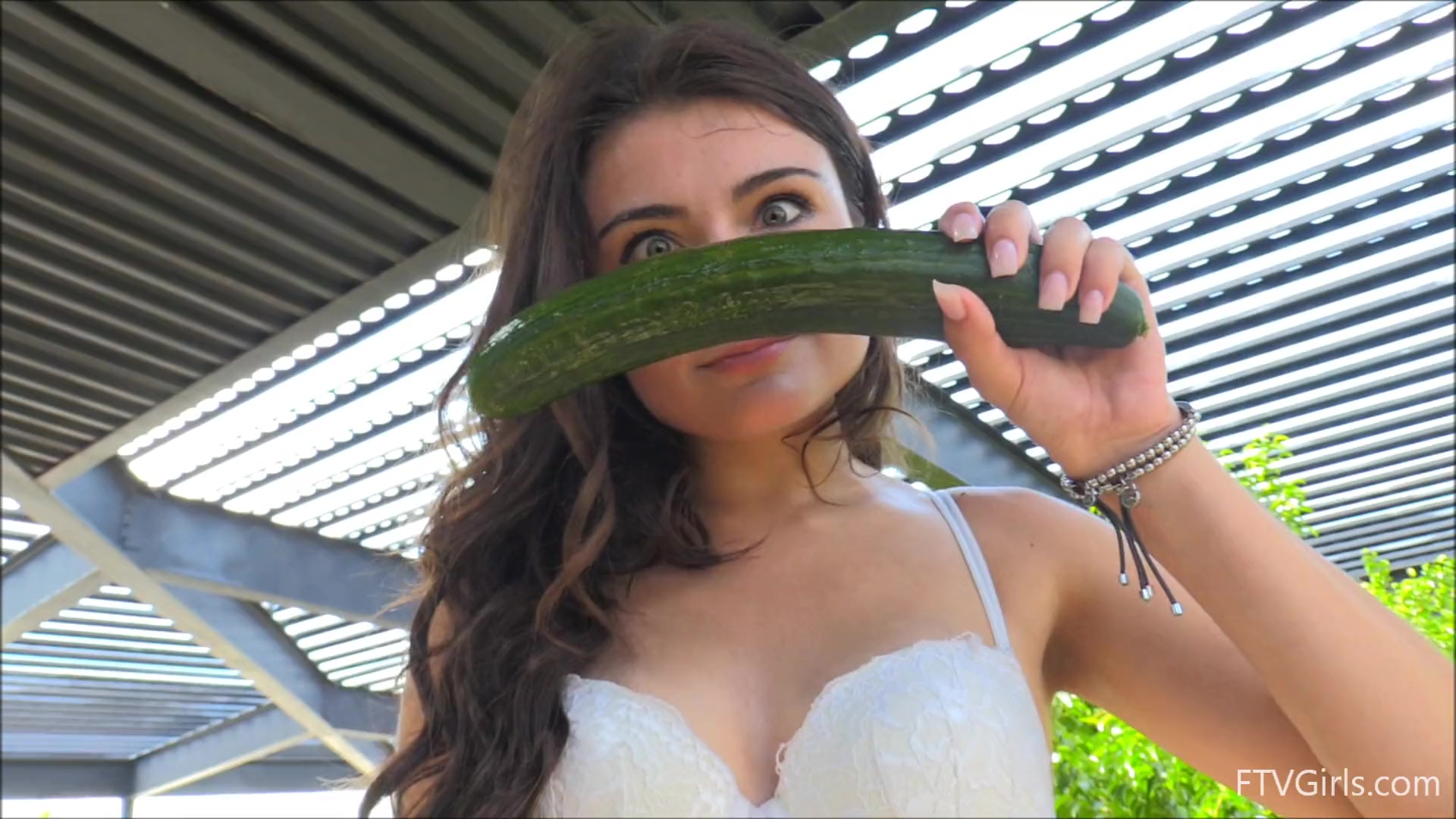 Sexy babe fucks herself with cucumber photo picture