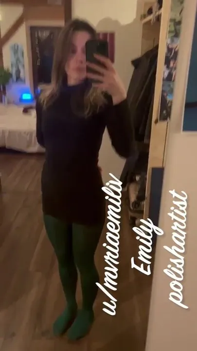 Green glossy tights and little black dress, quick selfie
