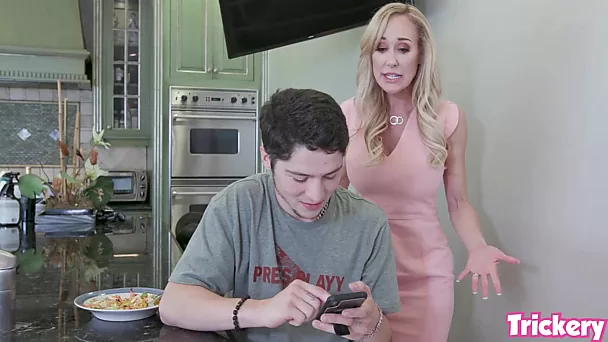 MILF got tired of her stepson constantly being on his phone and decided to distract him from it