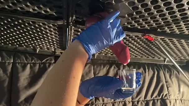 Teasing, squeezing and milking a dick in rubber gloves to collect all the cum