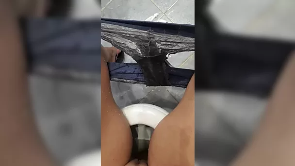 Russian MILF pees in the toilet