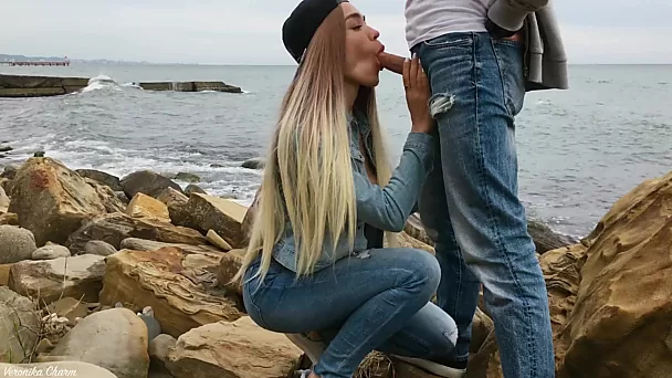 Cool girl Veronika Charm gives me a blowjob on the rocky beach