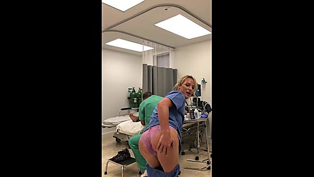 Hottest nurse EVER! Blonde MILF shows her tight butt and natural tits at the workplace!