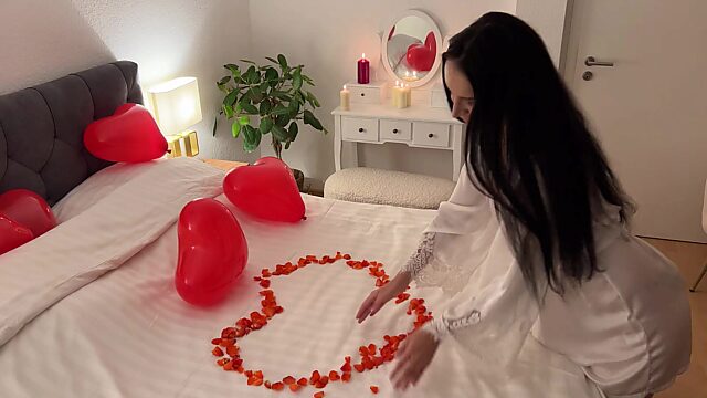 Horny69rabbits enjoys romantic sex on a bed strewn with rose petals