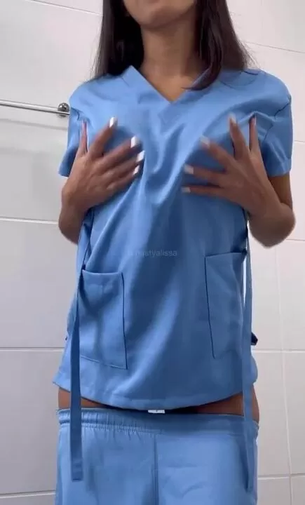 petite nurse ready for your exam