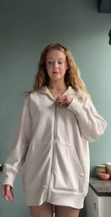Instructional video of how to zip a shirt
