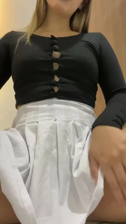 There's a tight little pussy hidden under this skirt