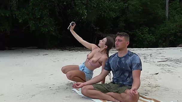 Girl doesn't care that this guy is meditating, she just wants his dick
