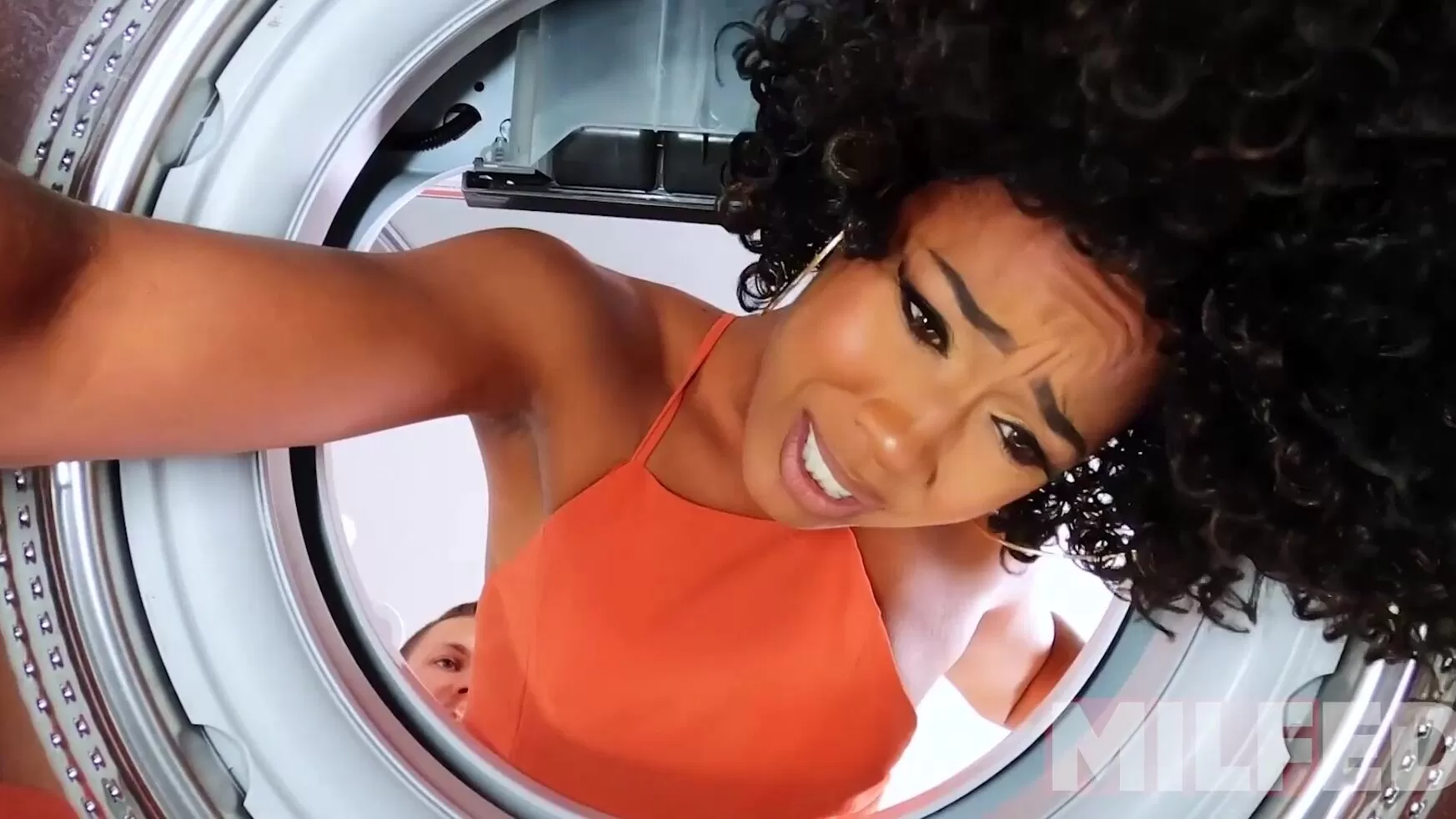 Stuck in the washing machine Ebony takes white cock from young lad