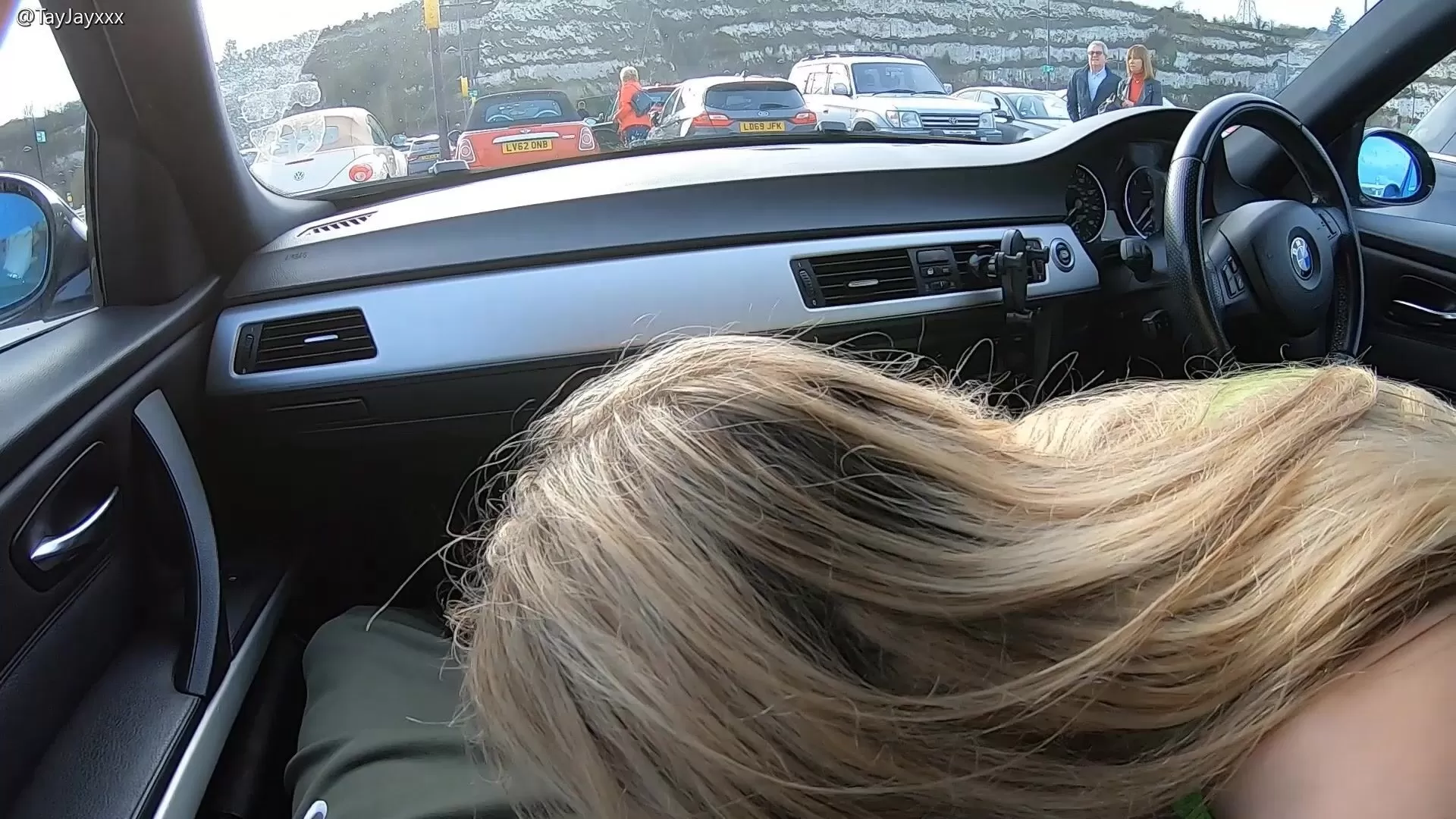 He had to hold back the moans as I sucked his cock in a car park with  people walking right by us [GIF]