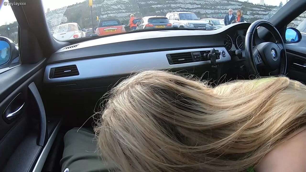 He had to hold back the moans as I sucked his cock in a car park with people walking right by us