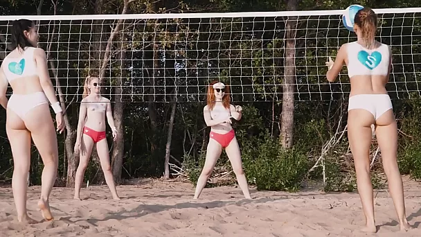 Energized beach babes have lesbian fun after volleyball game