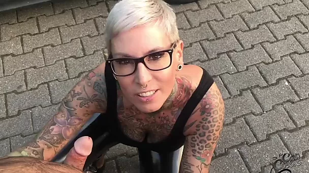 Inked Short-hair German MILF In Latex Leggings Pleases a Guy With BJ And Anal Sex On the Parking Lot