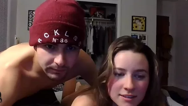 Cute teen couple is having sex on webcam at their place and read comments