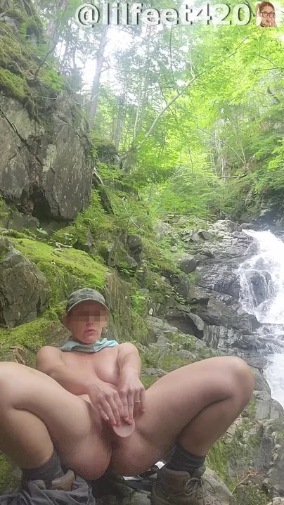 I fuck myself with a 9inch dildo and squirt like crazy next to a beautiful cascade