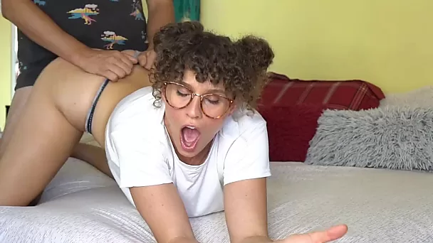 Curly MILF wears different glasses while being drilled in a doggystyle