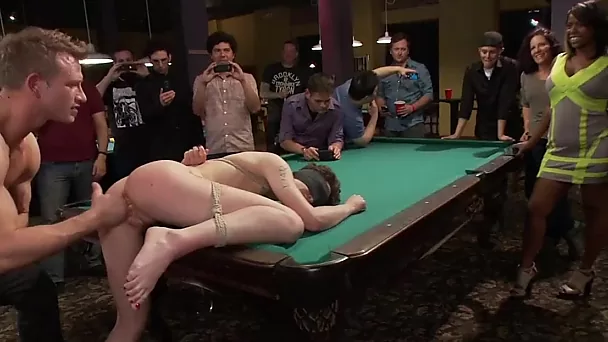 Slutty MILF publicly enjoys double penetration into her holes on a billiard table.