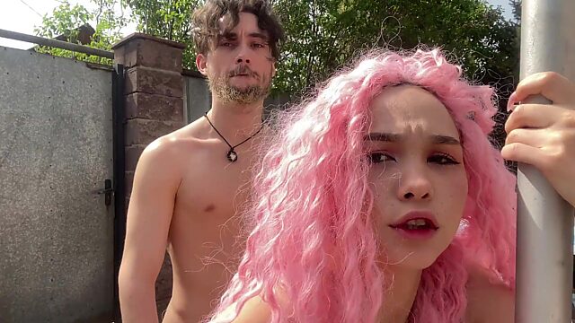 Pink-haired Russian bitch is dangerously fucked in the yard while her parents are at home.