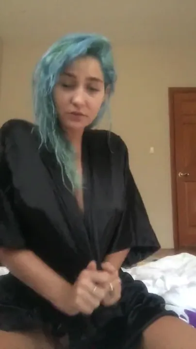 Chick with blue hair and a tight body