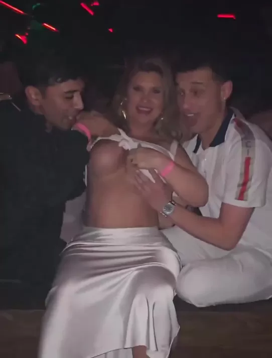 Sucking on big tits in the club