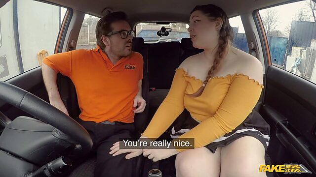 A curvy chick fucked a driving instructor in a car.