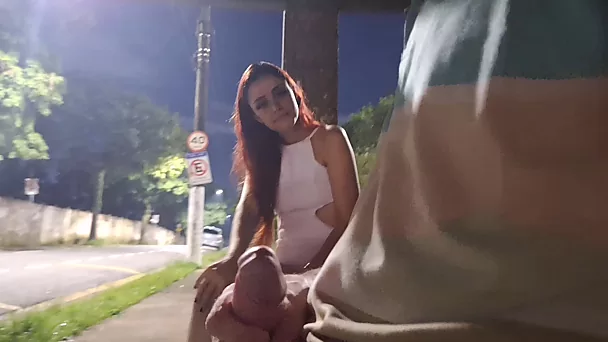 Kink redhead sucks a random guy's dick on a bus stop in the night