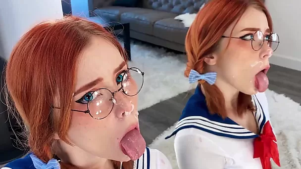 Sweet redhead teen in glasses sucks with pleasure and gets Cum on her Face