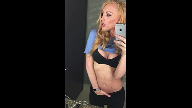Fit blonde goes solo in the bathroom