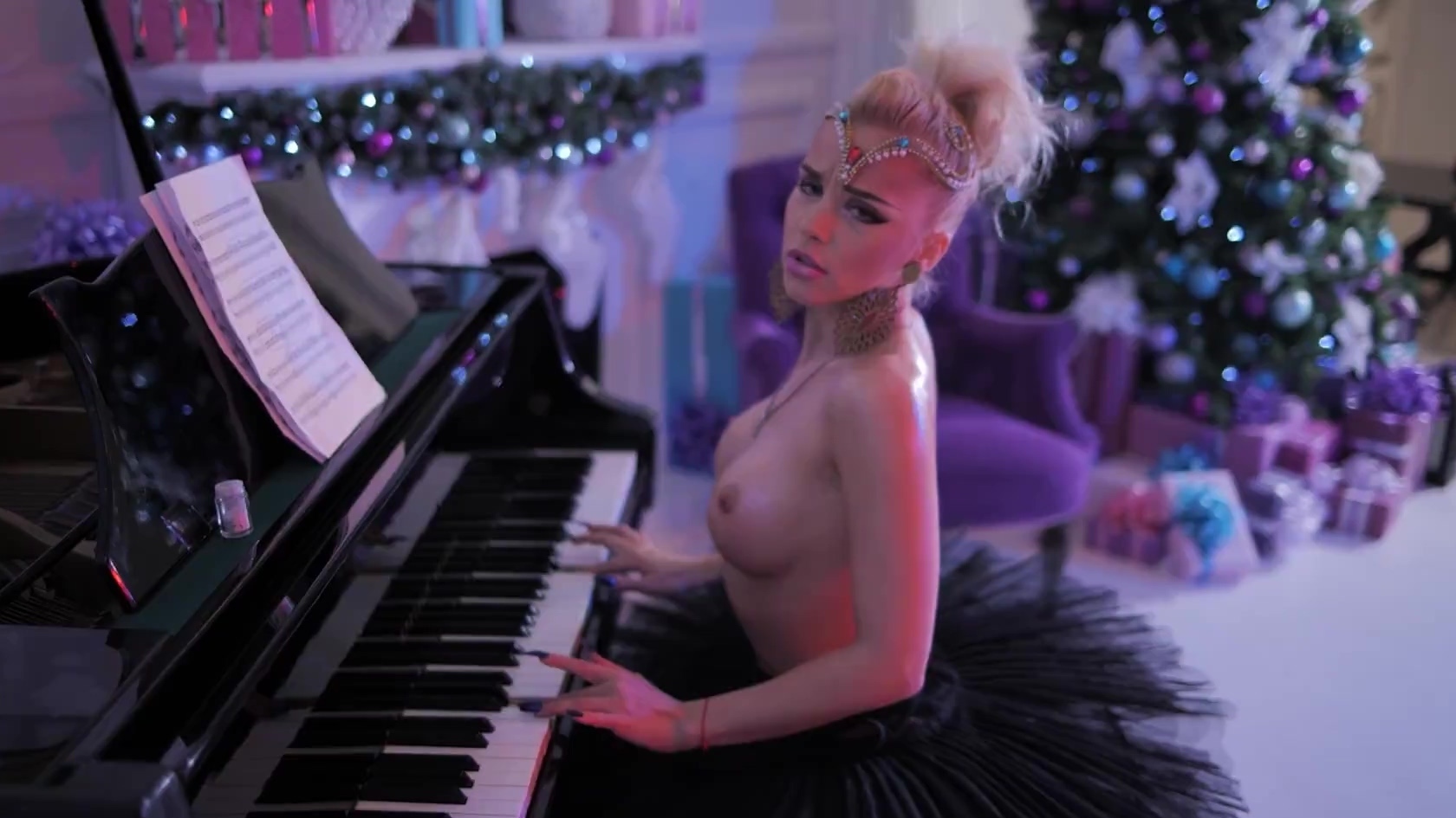 Beautiful ballerina Lara Frost dances and plays piano