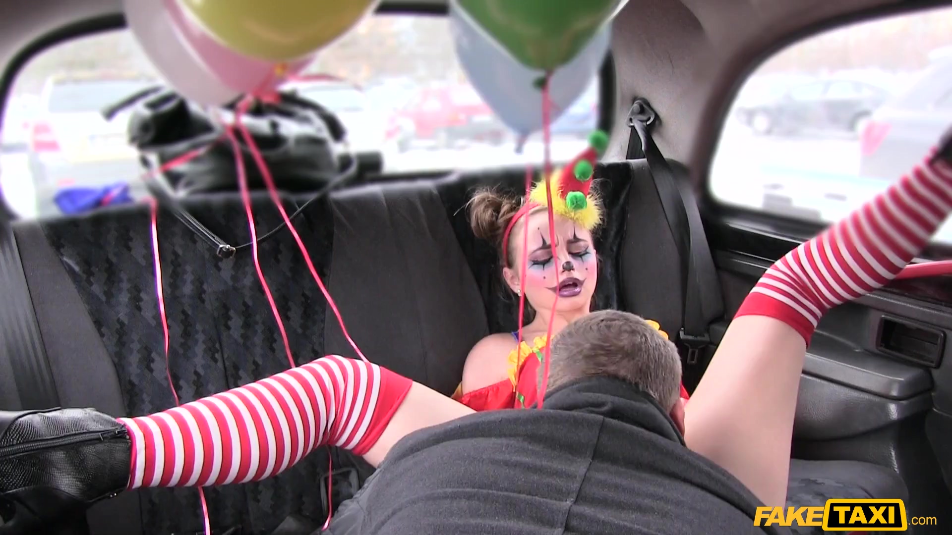 Kinky clown girl jumped on Drivers cock during Taxi Ride