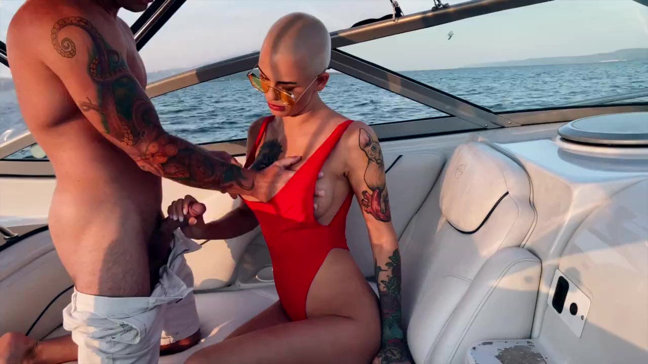 Tattooed Bald girl with perfect Boobs enjoys Outdoor Sex on the Yacht pic