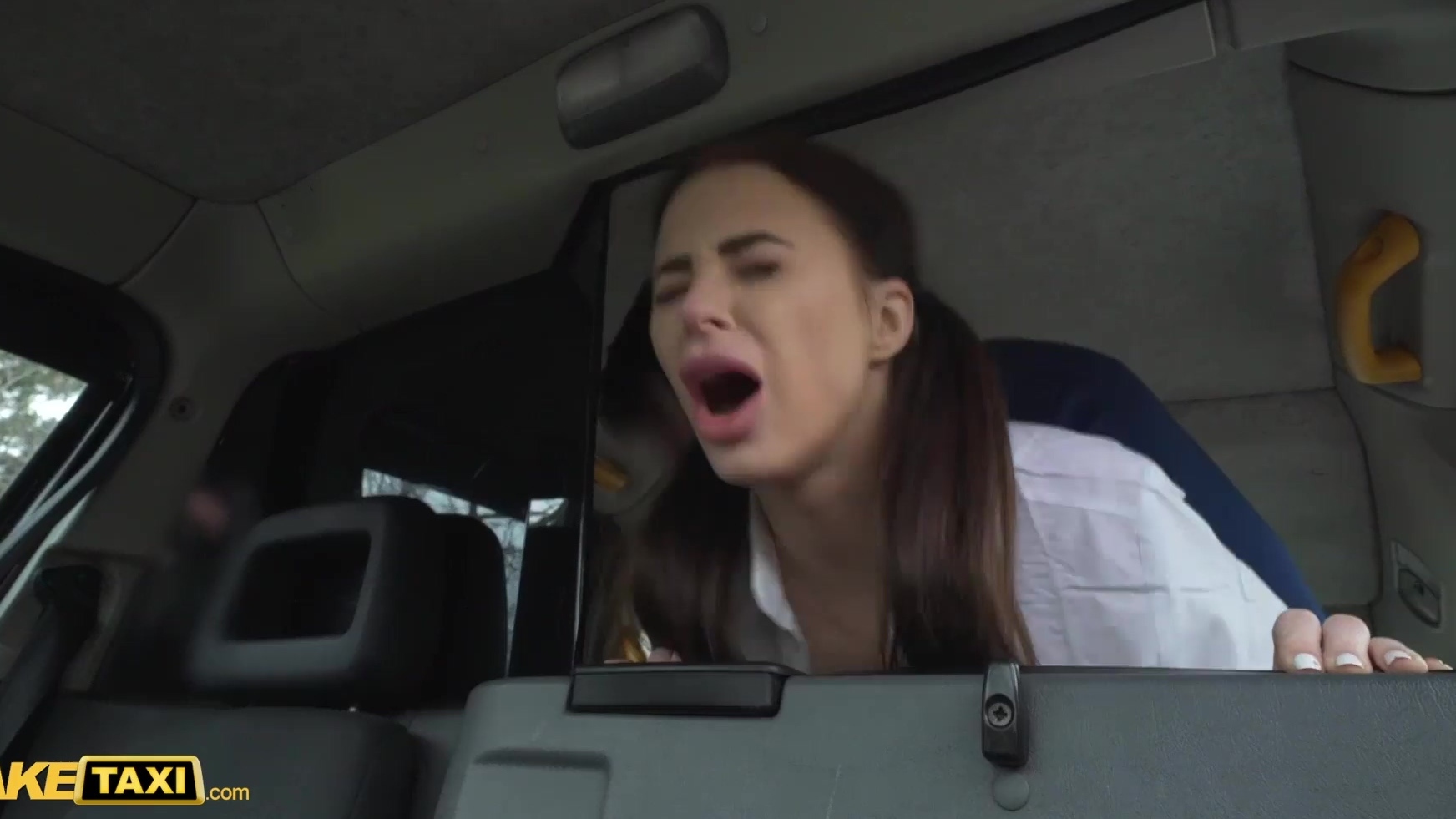 Taxi Sex - Brunette teen pays her fire by excellent sex skills in a taxi cab