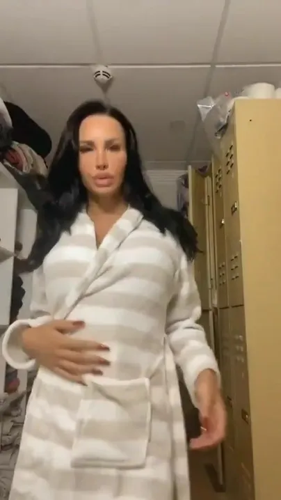 Big cock under her bathrobe. TS Kimberlee