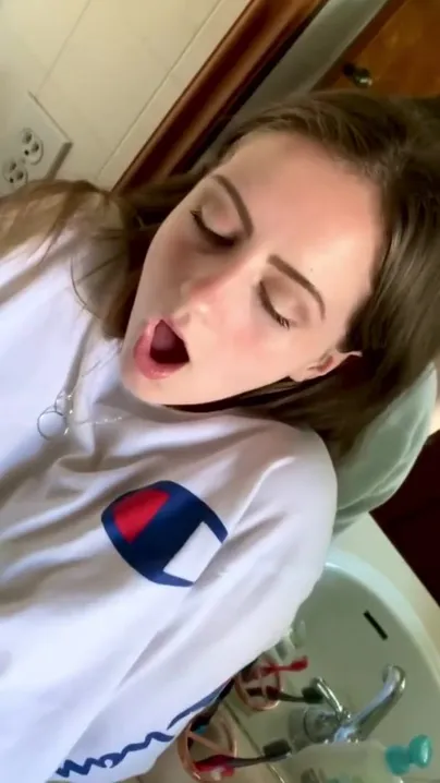 Getting filled with her shirt on
